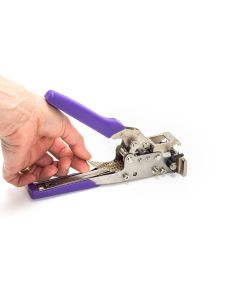 A shim strip being inserted into the ratchet-style splicing tool